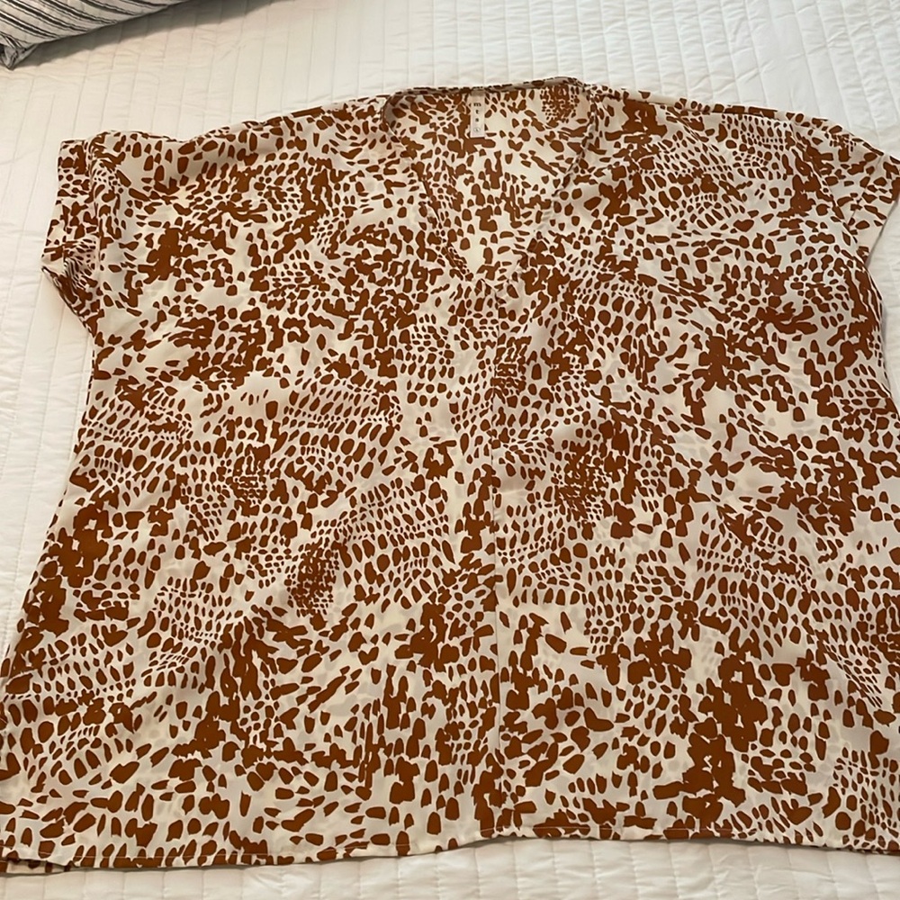 Lightweight, V-neck, cream, and tan top